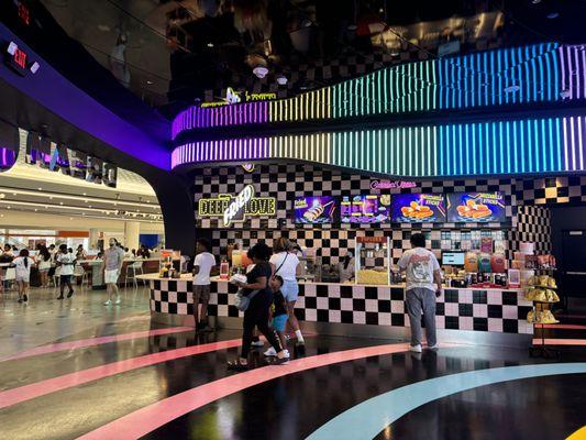 Ferris wheel is located on level 3 in the back of the food court