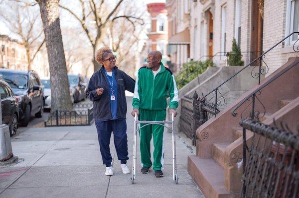 A patient and team member out for a walk.