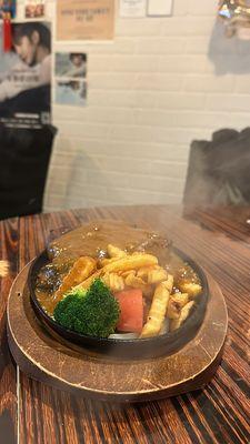 Sizzling plate with Black Pepper Sauce