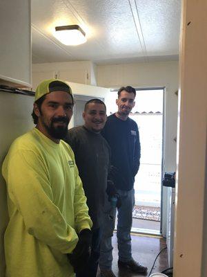 Victor, Jeremy and their other helper installing our new heater!