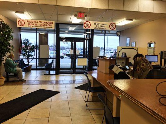 Front desk, waiting area, and entrance