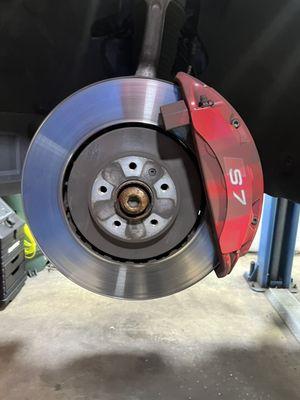 Before Audi S7, front brake pad and rotors