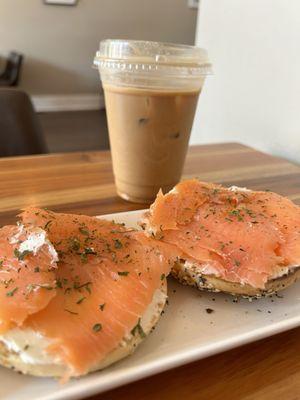 Iced peanut butter latte and an everything bagel with cream cheese and salmon.