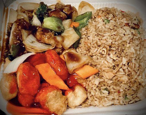 Combo plate w/ pork fried rice, sweet & sour pork and chicken in black bean sauce.