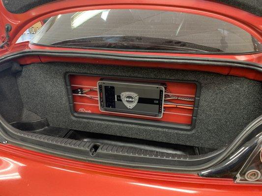 Custom Plexiglass Etched with RX-8 Rotary Logo and a Hertz Mille Power 5 Amplifier in a 2004 Mazda RX-8