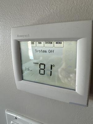 This is my thermostat, while it's off. AC is not allowed right now by management. It's 70F outside and all windows are open.