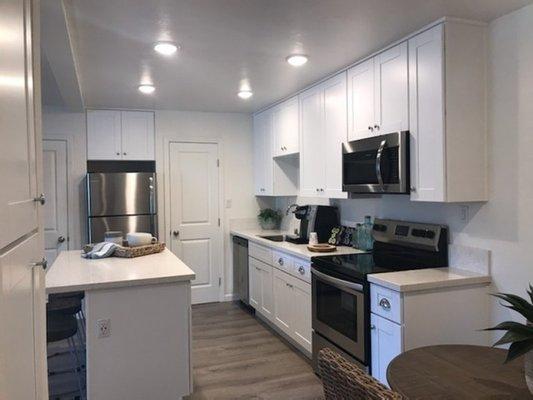 Recessed lighting and granite counter tops