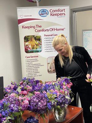 Our owner Kelleen Corfield arranging flowers to be delivered to our clients AND amazing Caregiver's.