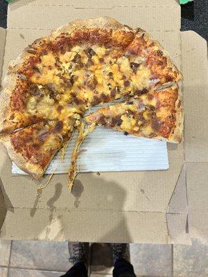 The extra pizza with 20% taken out.