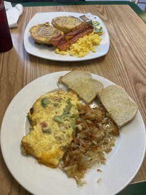 Vegetable omlet, hash browns sourdough toast.  Cinnamon swirl French toast bacon and eggs.