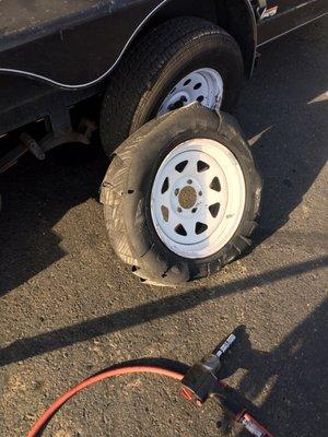 Blown trailer tire.