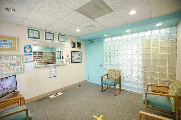 Spacious and well lit waiting area at Karimi Dental of Long Beach