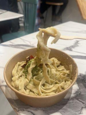 Pasta with pesto & sun dried tomatoes