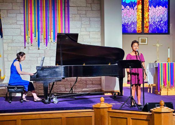 Voice student performing at recital.