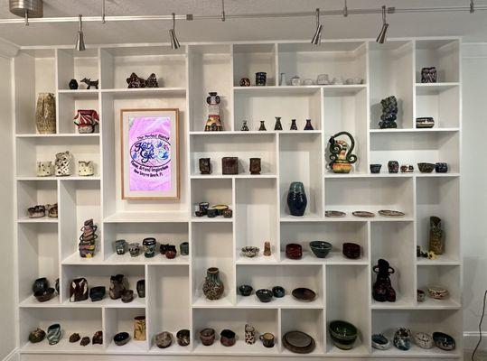 Gallery with pottery worked on by Kat who has autism