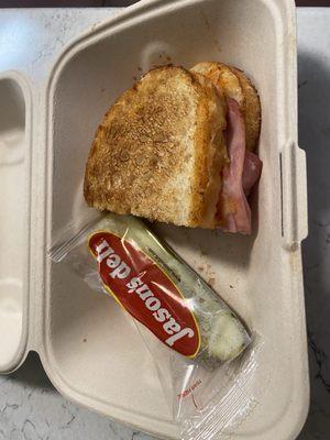 Half order of Cuban sandwich with packaged pickle