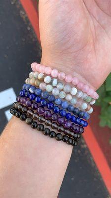 Variety of Crystal Bracelets to pick up after your self care appointment.