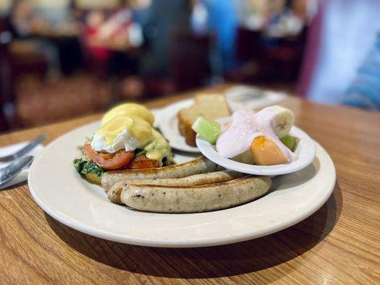 Eggs Benedict with Chicken Apple Sausage. Nice that it comes with banana bread, fruit & yogurt.