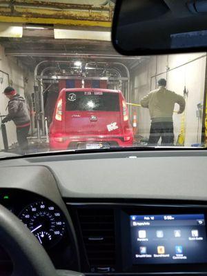 They spray your car off and then take soapy brushes and scrub every inch of your ride. And this is even before going into the wash!