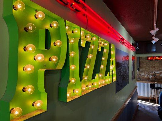 Illuminated pizza sign