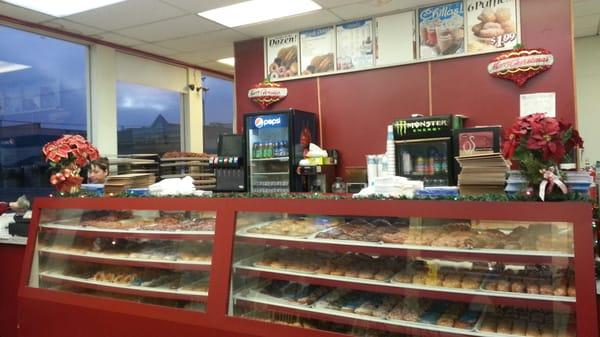 Counter with yummy donuts inside