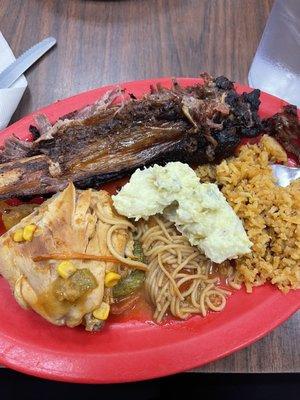 Beef ribs, potato salad, chicken, rice