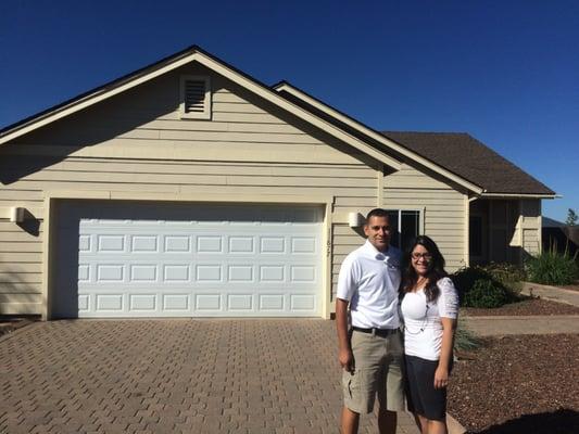 Clients: Michael and Erica in front of their new home in Bellemont, AZ