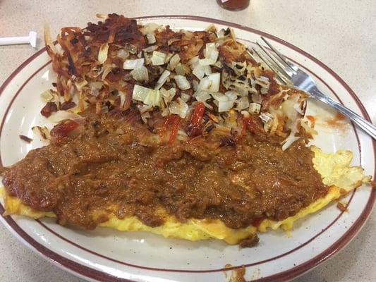 Chili cheese omelette w/ hash browns+grilled onions. If you like chili cheese omelette you MUST to go to Leo's. It's insane.