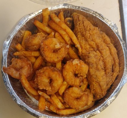 Fried whiting with shrimp and seasoned fries. You get 3 pieces of whiting and 6 shrimp. Tasty!