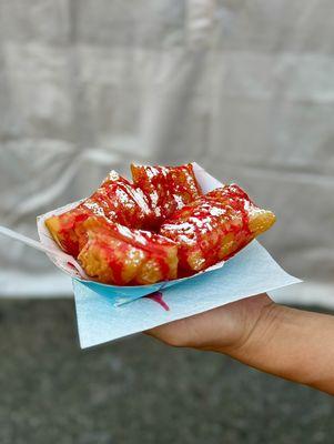 Beignets w/strawberry glaze @ France Street