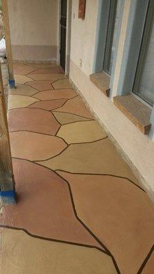 Patterned concrete porch after