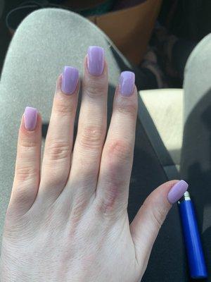 Horribly done powder dip nails. Picked blue (sc7 color that was displayed) it turned out bright purple. Lady wouldn't listen.