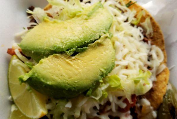 Look how high the steak tostada is compared to the lime.