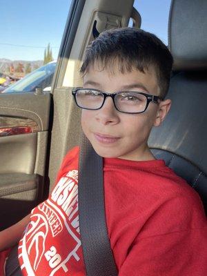 My 11 year old with his new glasses from La Verne Optometry.