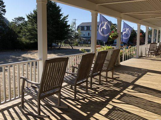 Porch with rockers.  And there is a beach wheelchair!  With huge fat wheels to go on the sand.