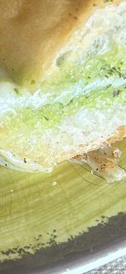 Image of sandwich with black hairs melted into the sandwich   Yuck yuck yuck.