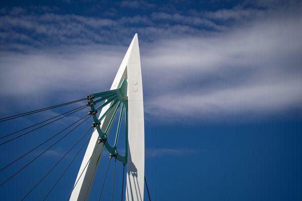 Top of one pedestrian bridge, with bow and arrow design