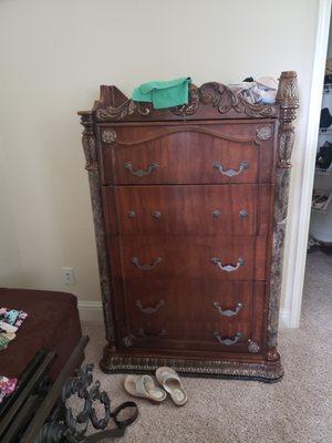 Dresser is upside down in our bedroom as it will not stand missing a leg