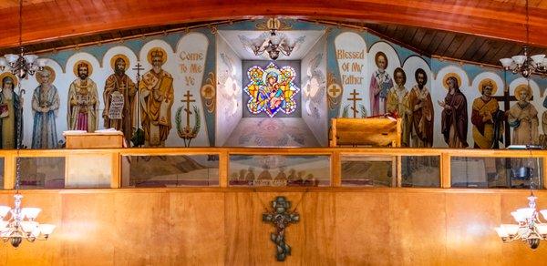 Our choir loft stained glass window and icons