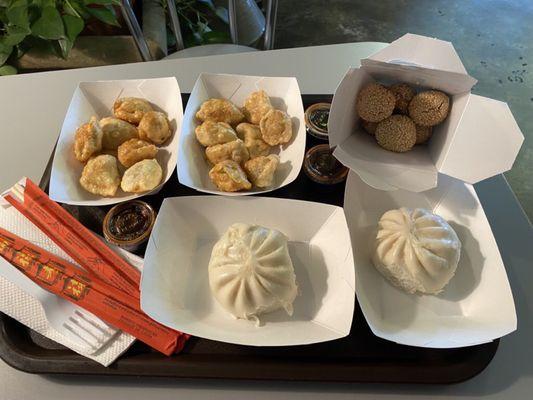 Fried Pork Dumplings ($5.75 each; 7 pieces each). Steamed Pork Buns ($2.50 each). Sesame Balls ($4, for 6 pieces).  Jan, '24.