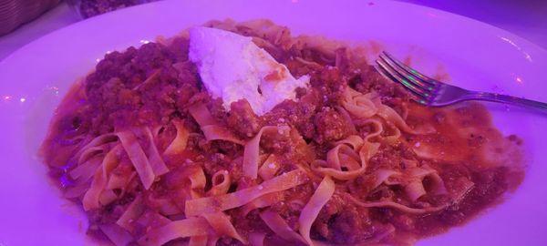 humongous portion of pasta bolognese. Delicious ricotta on top, savory meat sauce, and the pasta tasted fresh.  Yum!