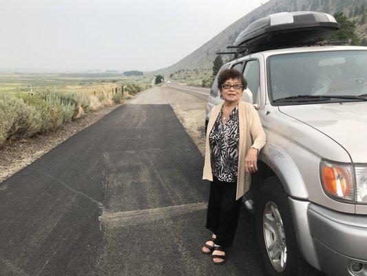 7/22/2018:  My Mom is in front of the background of David Walley's Mineral Hot Springs & the Kingsbury Grade on the right via Genoa, Nevada.