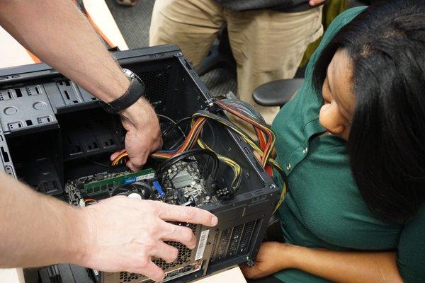 Students working on the A+ computer build lab