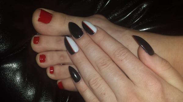 My new nails! Couldn't be happier! The underside of my acrylic nails are red also!