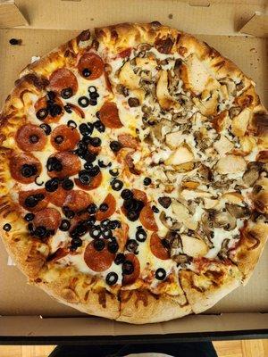 X-large 1/2 pepperoni and olives and the other half is chicken and mushrooms.