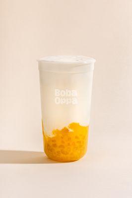 Cocomango. Experience the refreshing taste of coconut milk mixed with fresh blended mangos and mango boba.