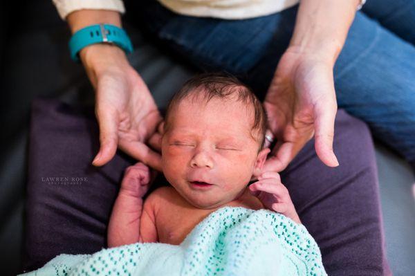 Baby's first adjustment. Photo credit Lawren Rose Photography.