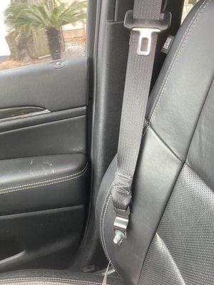 The passenger-side seatbelt... they never put it back together and couldn't tell me why they took it off in the first place.