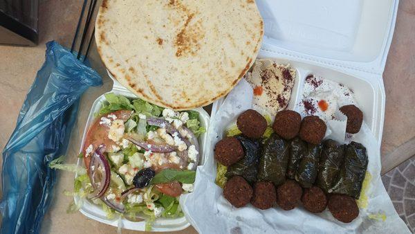 Veggie Plate. Salad, 1 pita, hummus, tahini sauce, rice, grape leaves, falafel