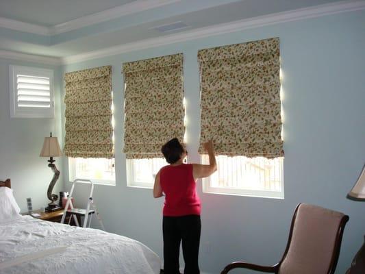 adjusting our roman shades